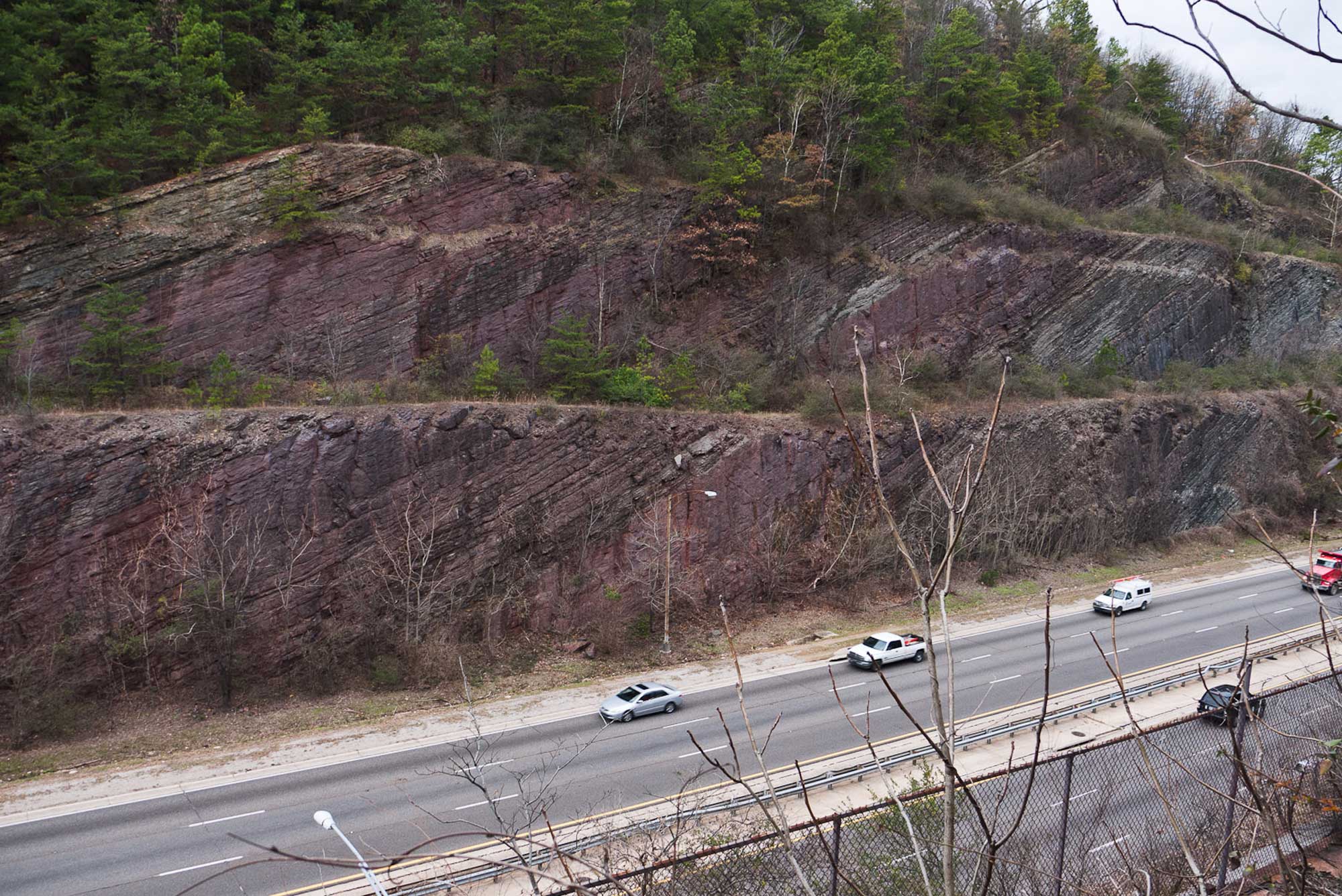 Photograph of a large outcropping of Silurian strata at Red Mountain, Alabama.