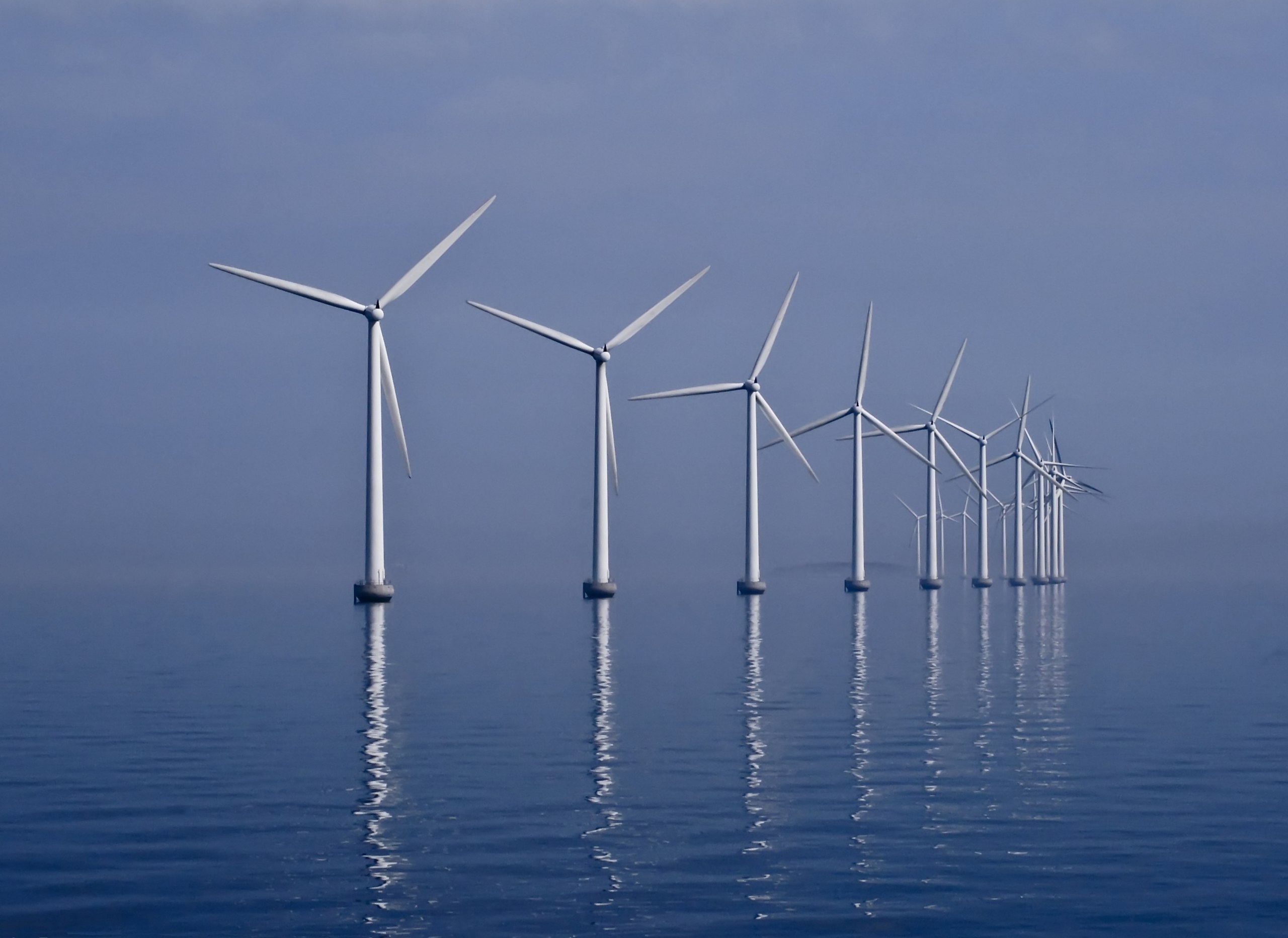 Offshore wind farm: a group of wind turbines in the sea off the coast of Denmark