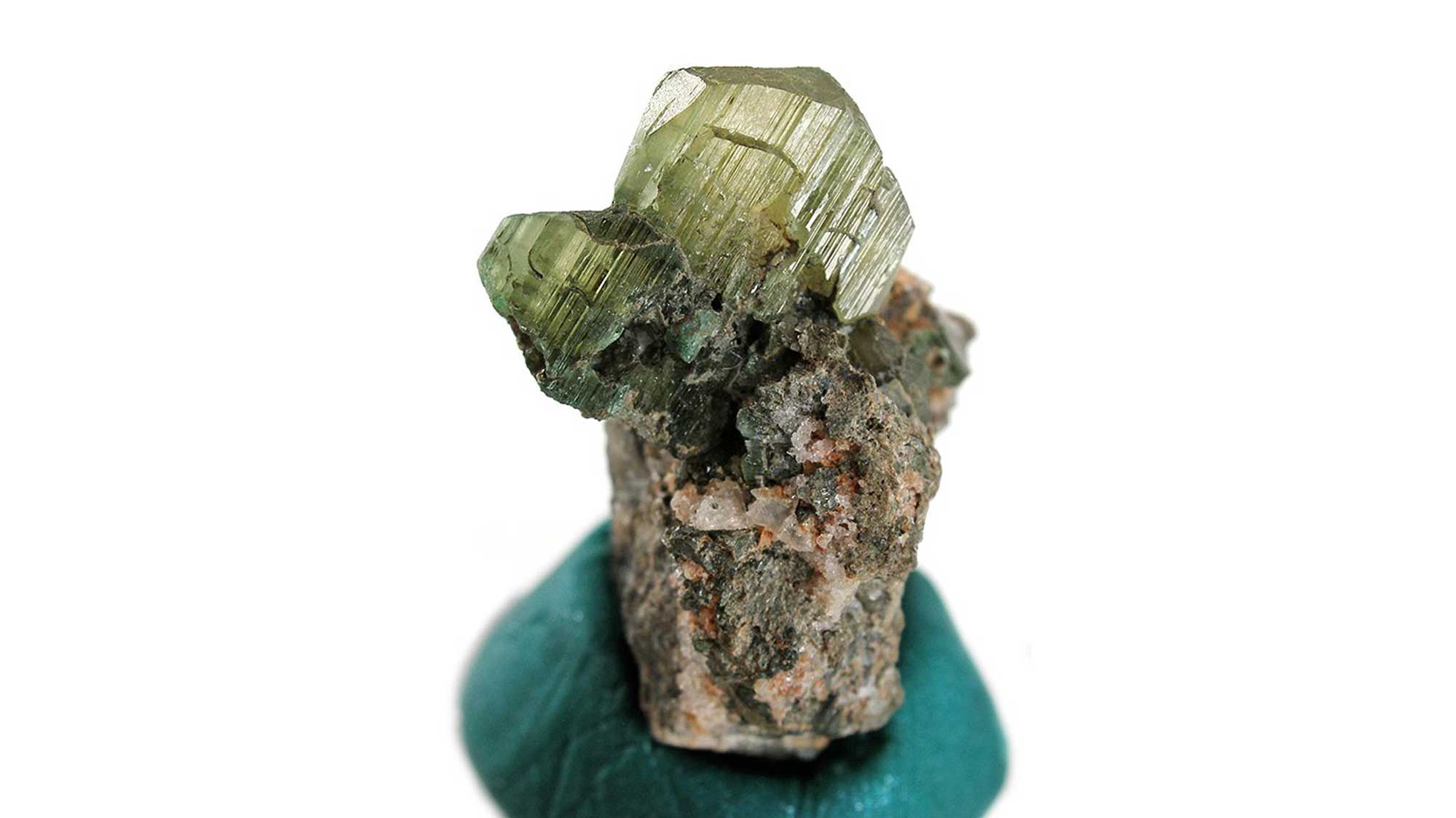Photograph of a sample of the mineral hiddenite from North Carolina.