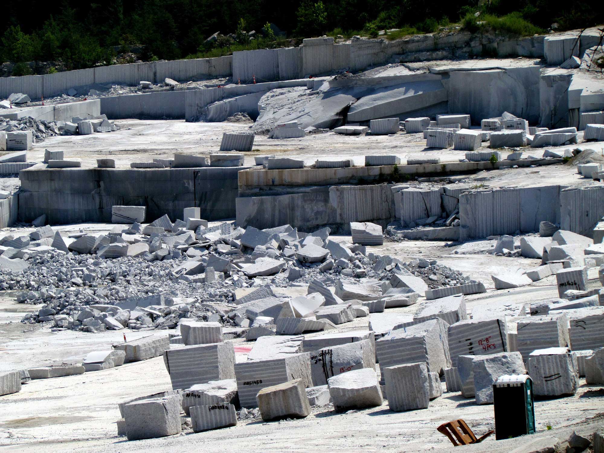 Photograph showing large blocks of rock inside the Mt. Airy Quarry in North Carolina.
