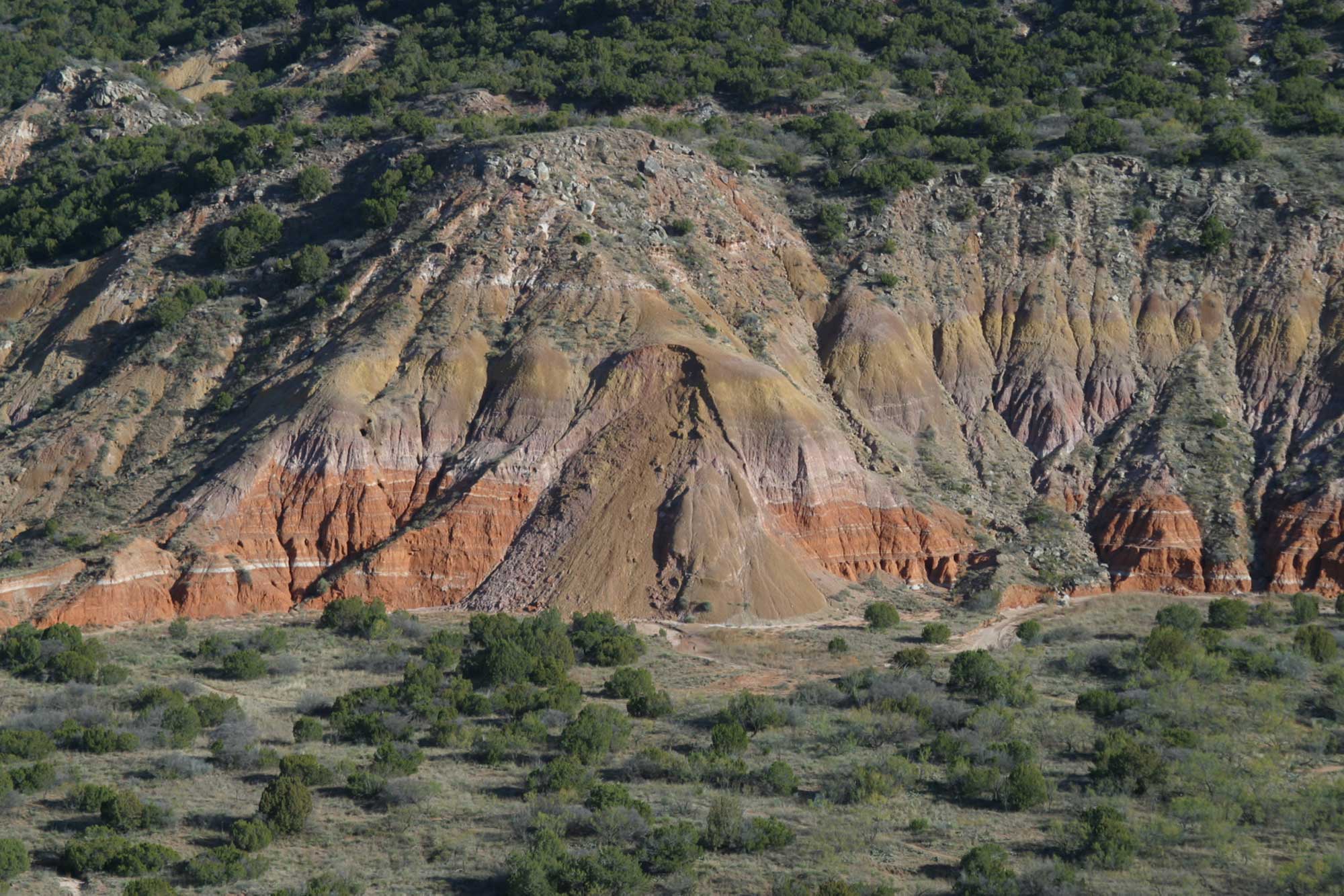 Photograph of a hill in Palo Duro Canyon, Texas that shows a recent landslide.