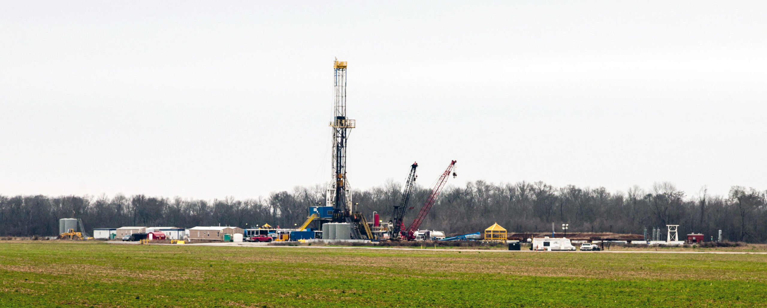 Photograph of a drill rig and associated equipment for fracking natural gas in the Haynesville Shale, Louisiana, 2013.
