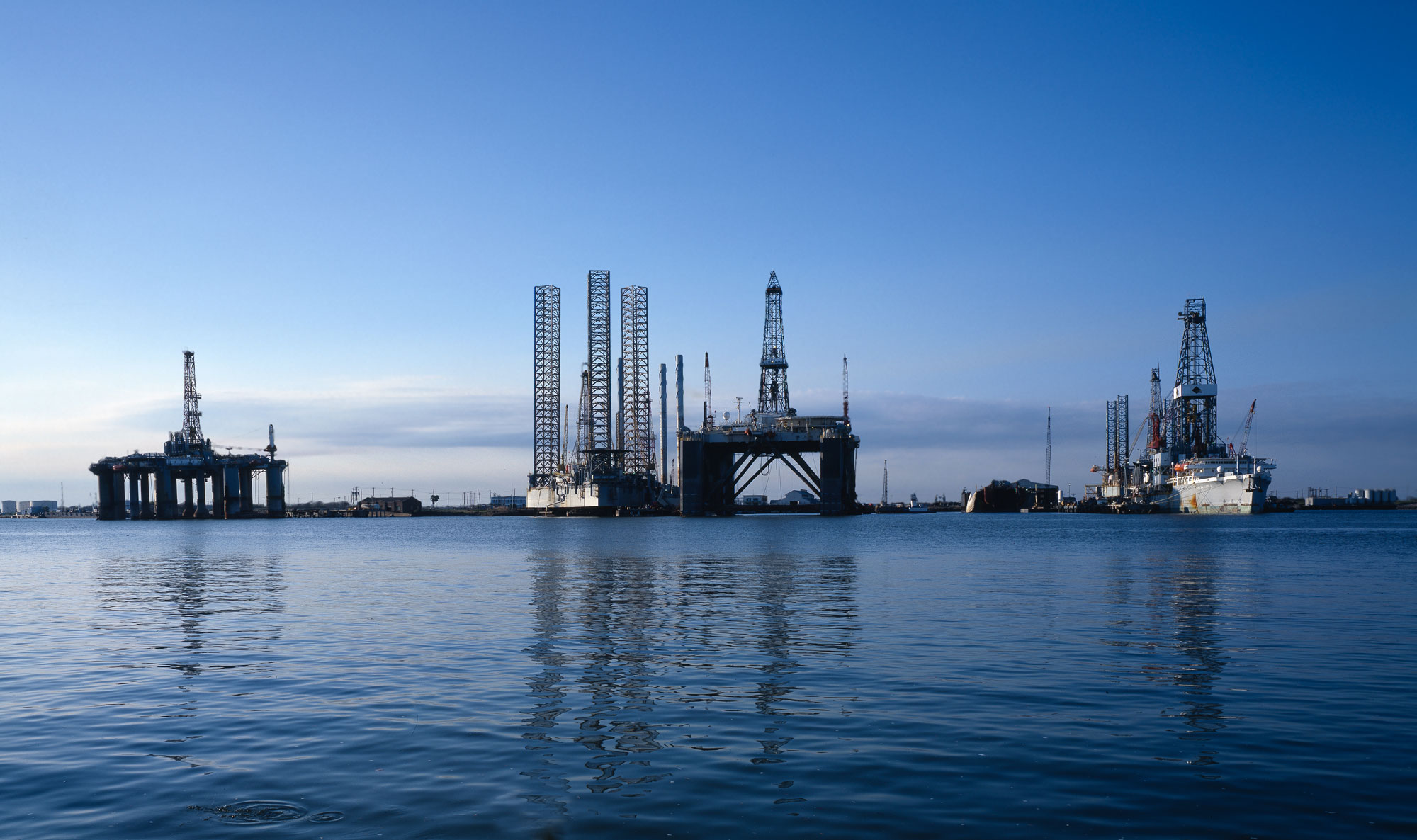 Photograph of oil rigs in the water off Galveston, Texas.