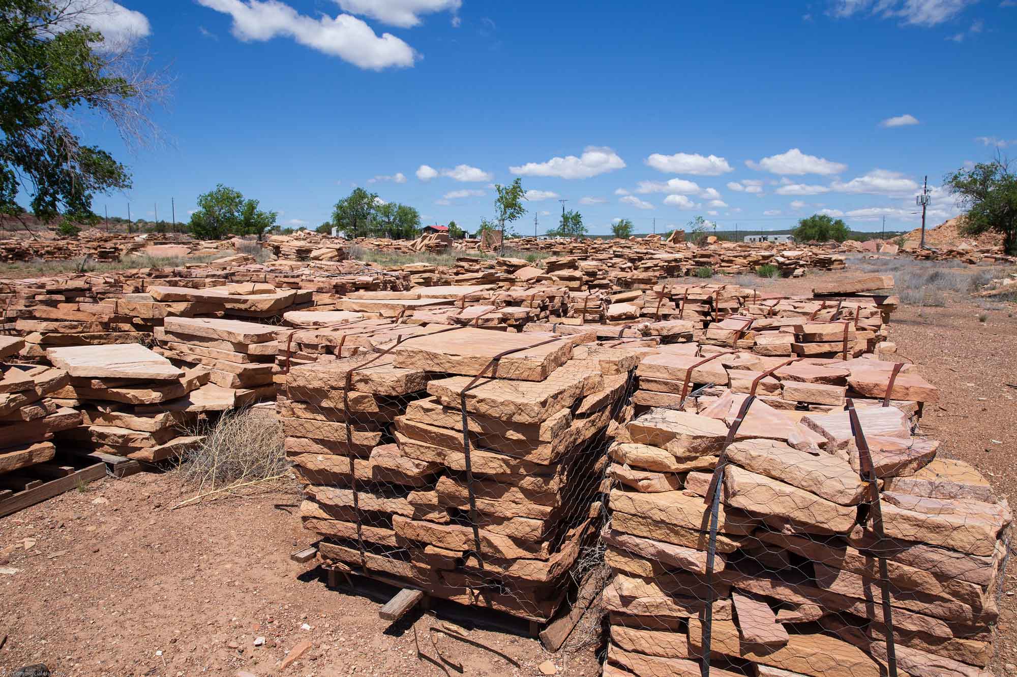 Photograph of stacks of sandstone flagstone slabs at Ash Fork, Arizona.