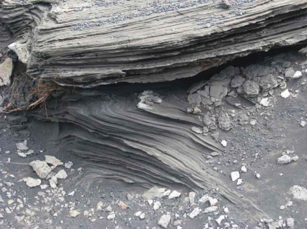 Photograph of layers of ash from explosive eruptions of Kilauea on Hawaii.