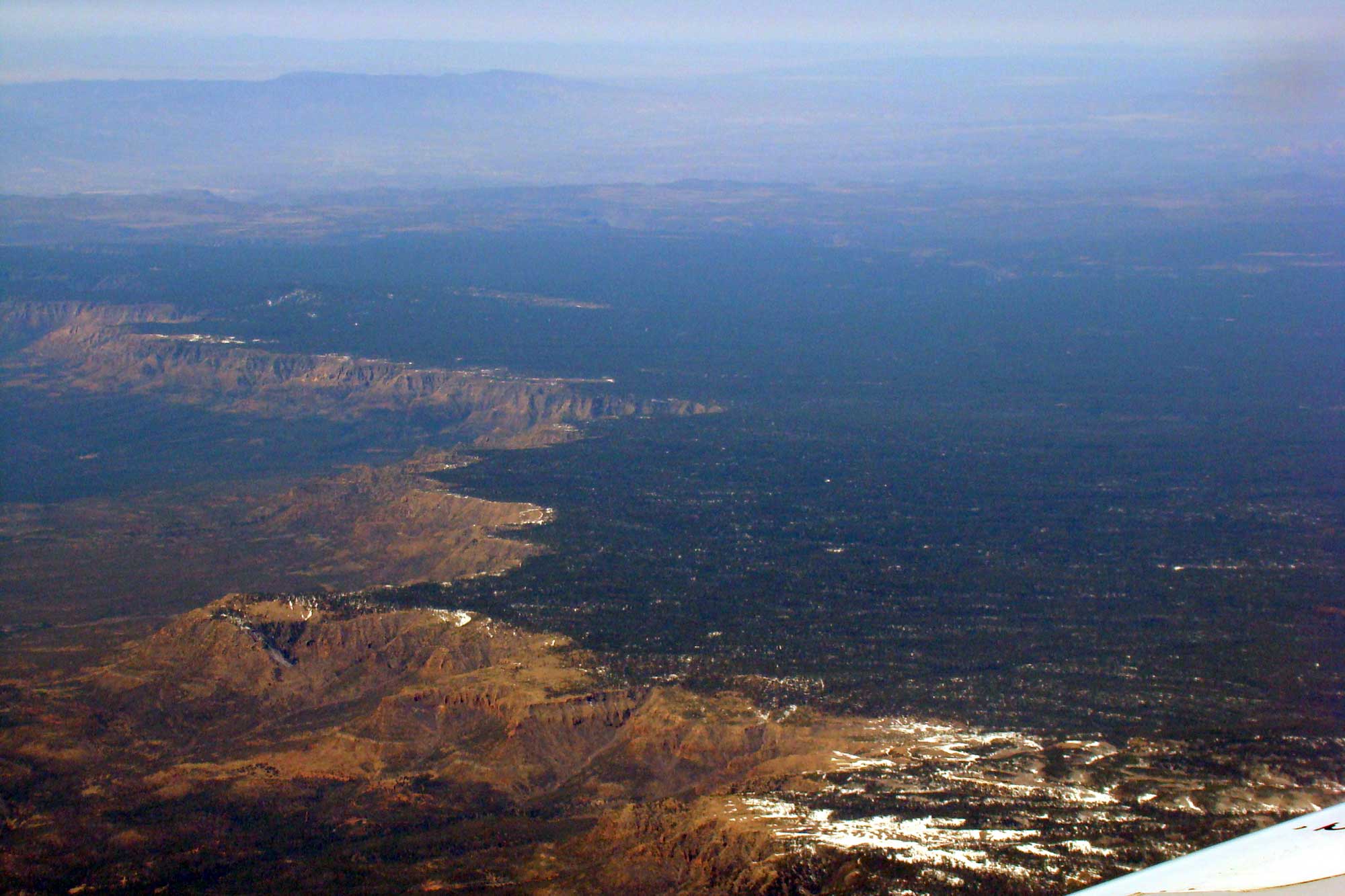 Photograph from an airplane of the Mogollon Rim in Arizona.