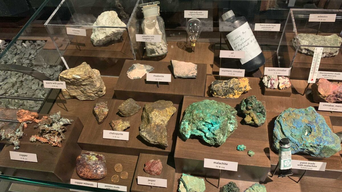 Photograph showing specimens of different types of minerals found in Alaska.