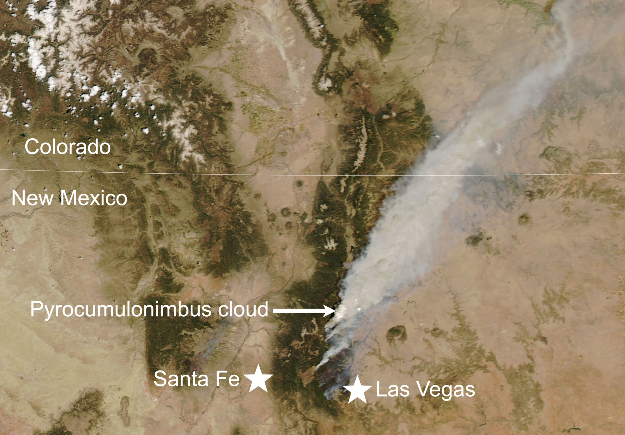 Satellite image showing smoke from the Calf Canyon-Hermit Peak fire on May 10, 2022. The photo shows a plum of smoke extending from the bottom-center to the upper right corner. A pyrocumulonimbus cloud formed by the fire is labeled.