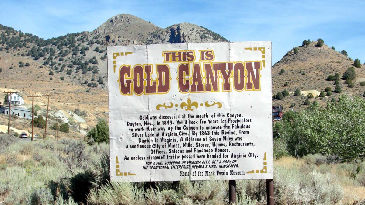 Photograph of a sign that says "This is Gold Canyon" in front of mountains in Dayton, Nevada.