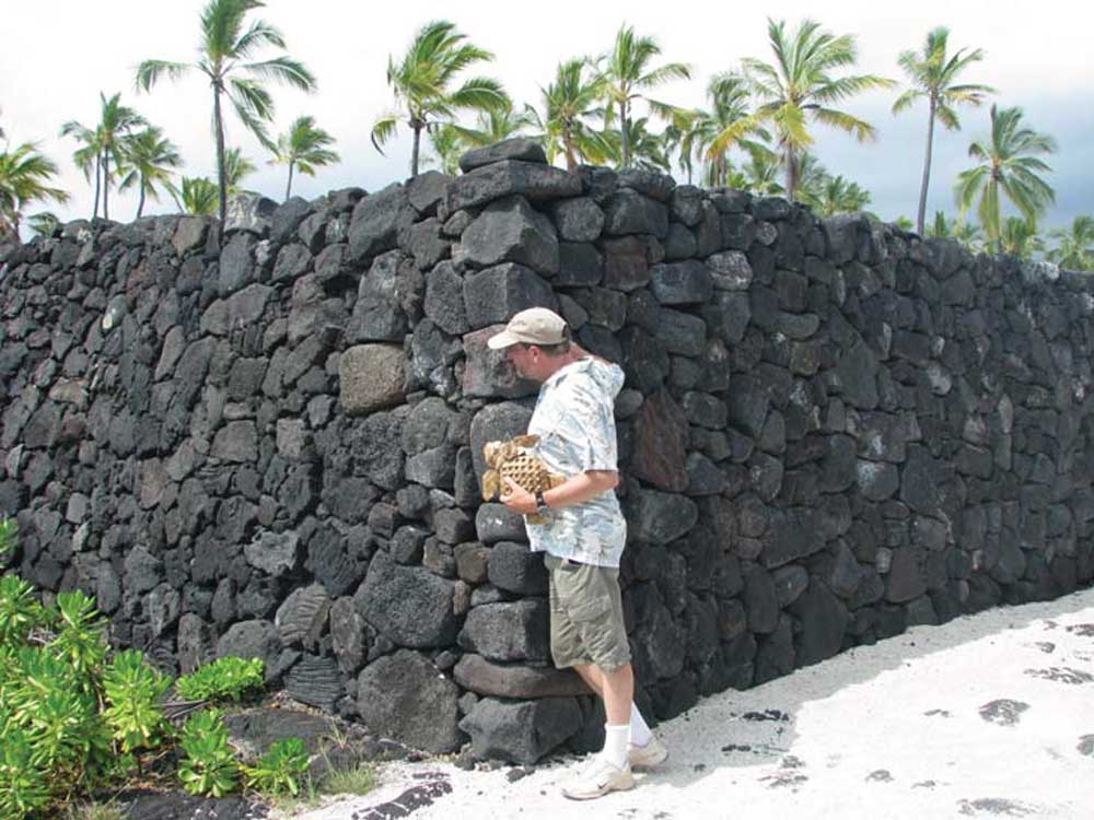 Photograph of an ancient stone wall at Pu‘uhonua O Hōnaunau National Historical Park in Hawaii.