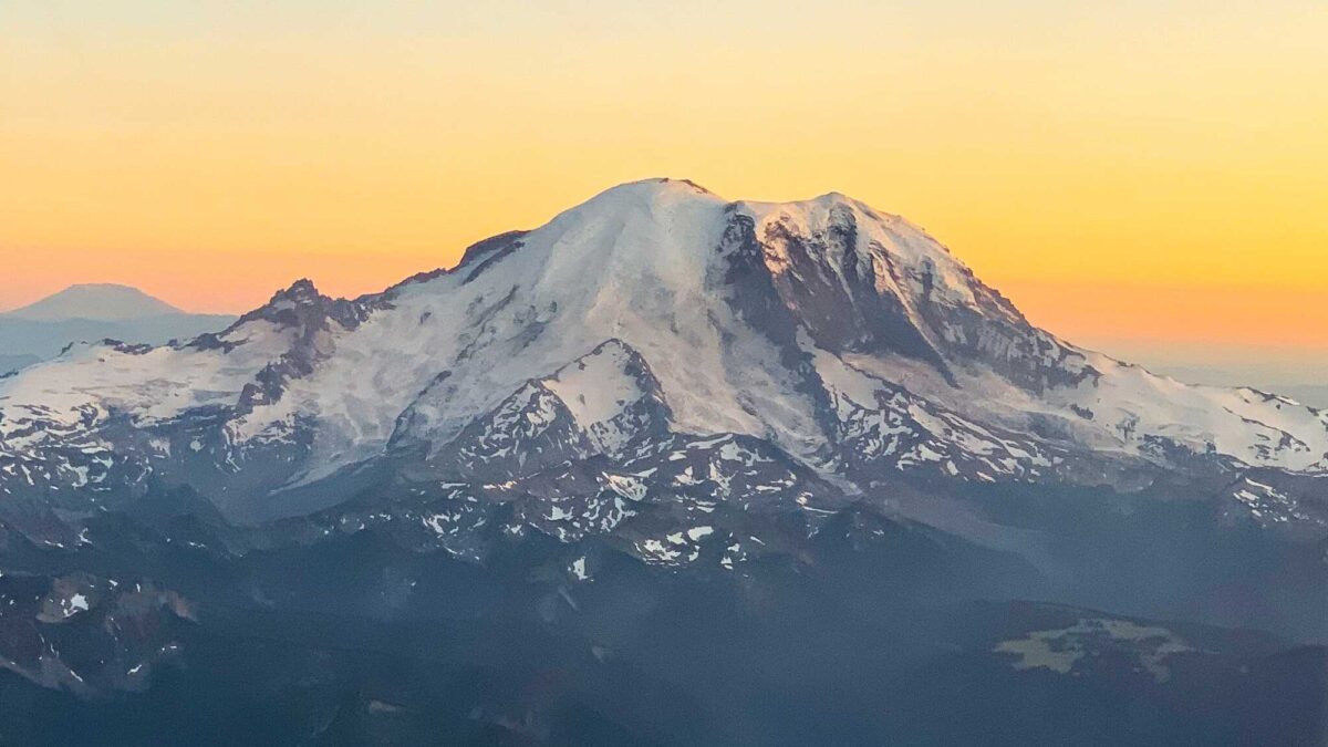 Photograph of Mount Rainier in Washington at sunset.