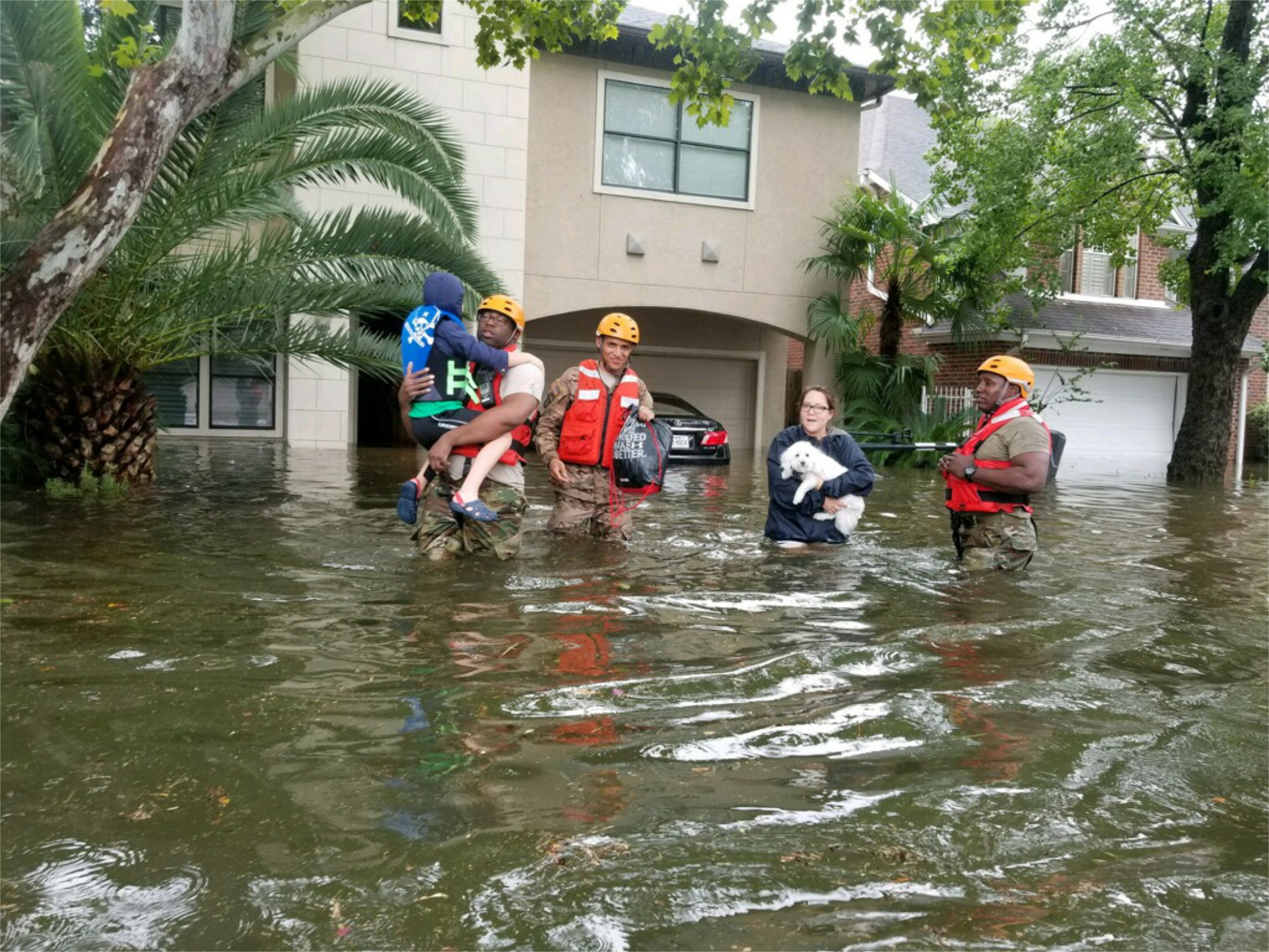 Photograph of the Texas National Guard helping people during Hurricane Harvey.