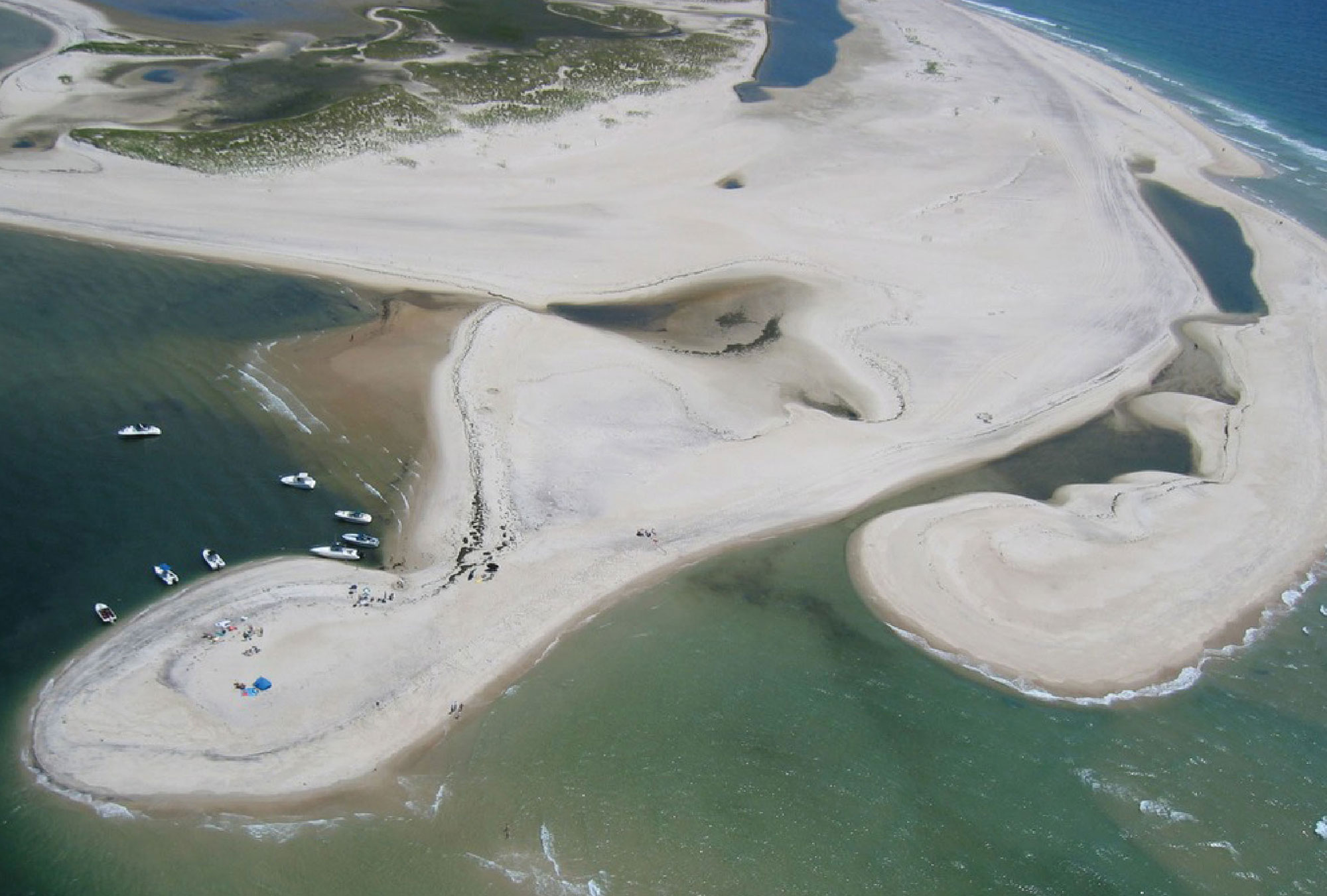 Photograph of sandy beaches at Fire Island, New York. The beaches are made up of reworked moraine sediments.