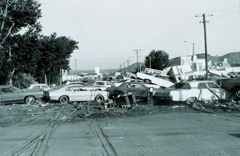 Photograph of a pile-up of cars that were swept away by the 1972 Black Hills Flood in Rapid City, South Dakota.