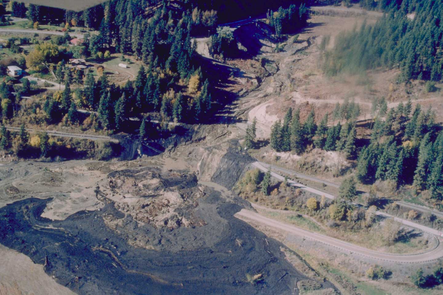 Photograph of a mud flow in Bonners Ferry, Idaho, which covered several sections of road.