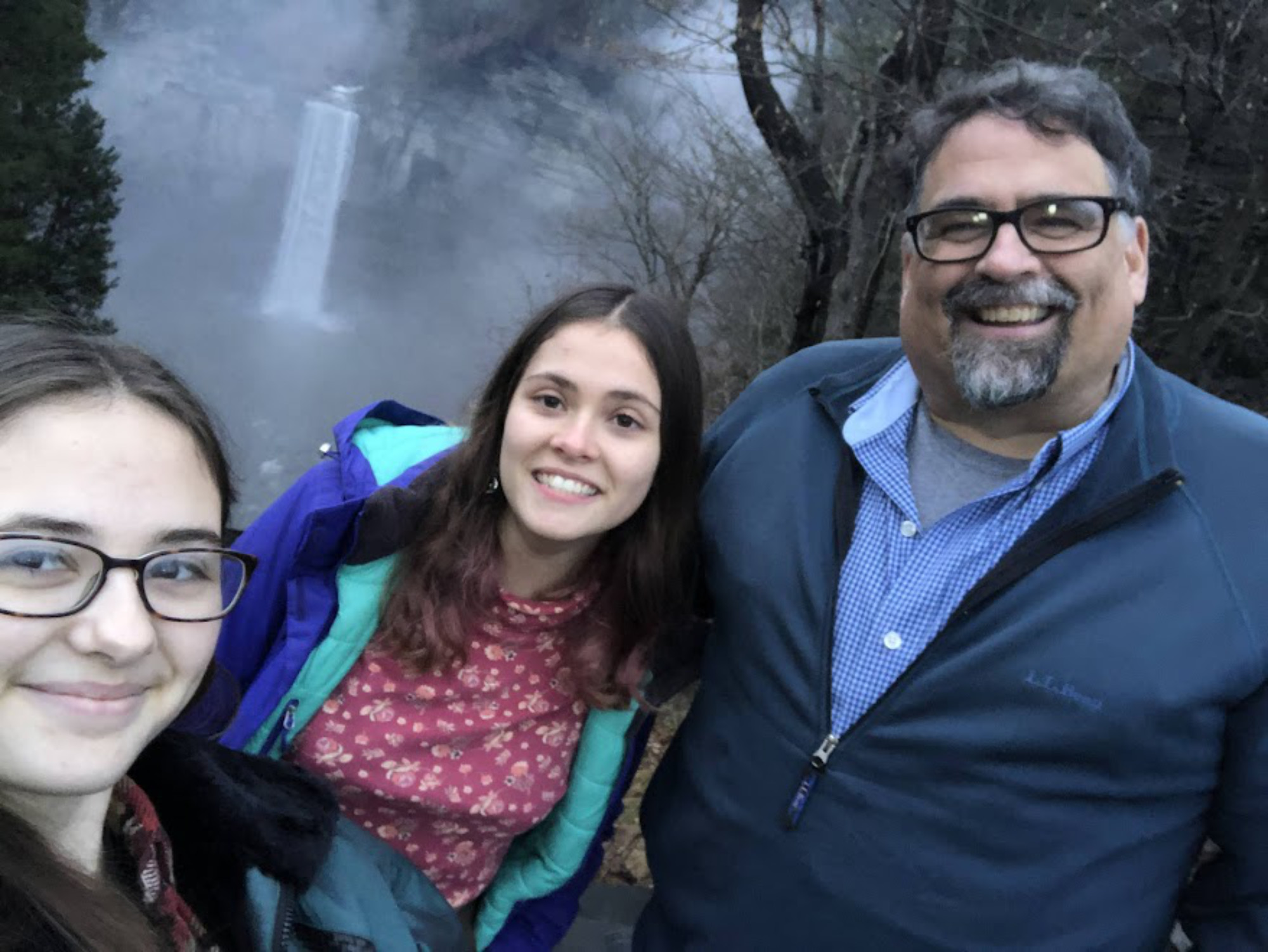 Photo of a father and his two daughters