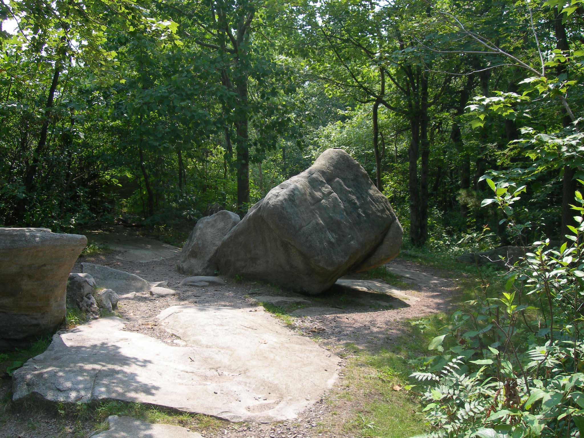 Photo of boulder with USGS marker denoting the highpoint in the state of Pennsylvania, Mount Davis.